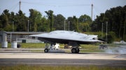 The U.S. Navy conducted the first fly-in arrested landing of the X-B, a tailless, strike fighter-sized unmanned aircraft designed to take off from and land on moving aircraft carriers at sea.Here's a brief look at the latest in the growing drone army.